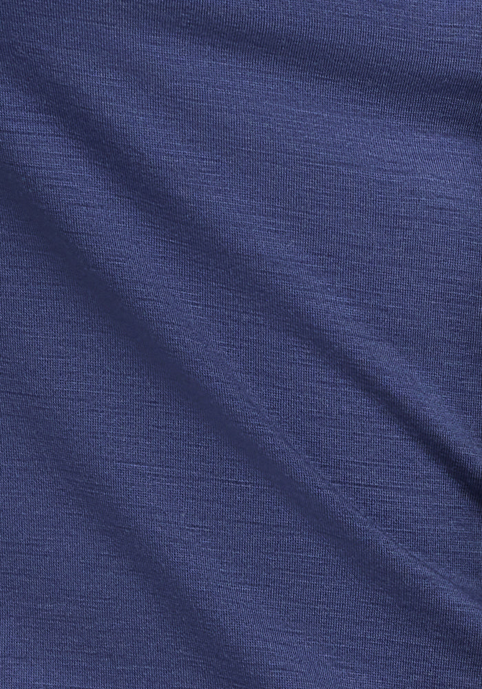 Close-up of the Blue Horizon fabric for the Woolx Gracie Bodysuit, featuring a subtle diagonal texture. The smooth surface has a soft sheen, providing ultimate comfort with its fine weave details—perfect for your summer wardrobe.