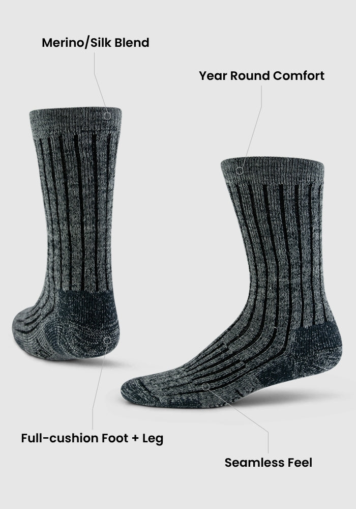 Two Warm Violet Woolx Mens Joey Crew Socks are shown from side and front angles, highlighting their Merino/silk blend, year-round comfort, full-cushion foot and leg, and seamless feel—ideal cozy crew socks for any season.