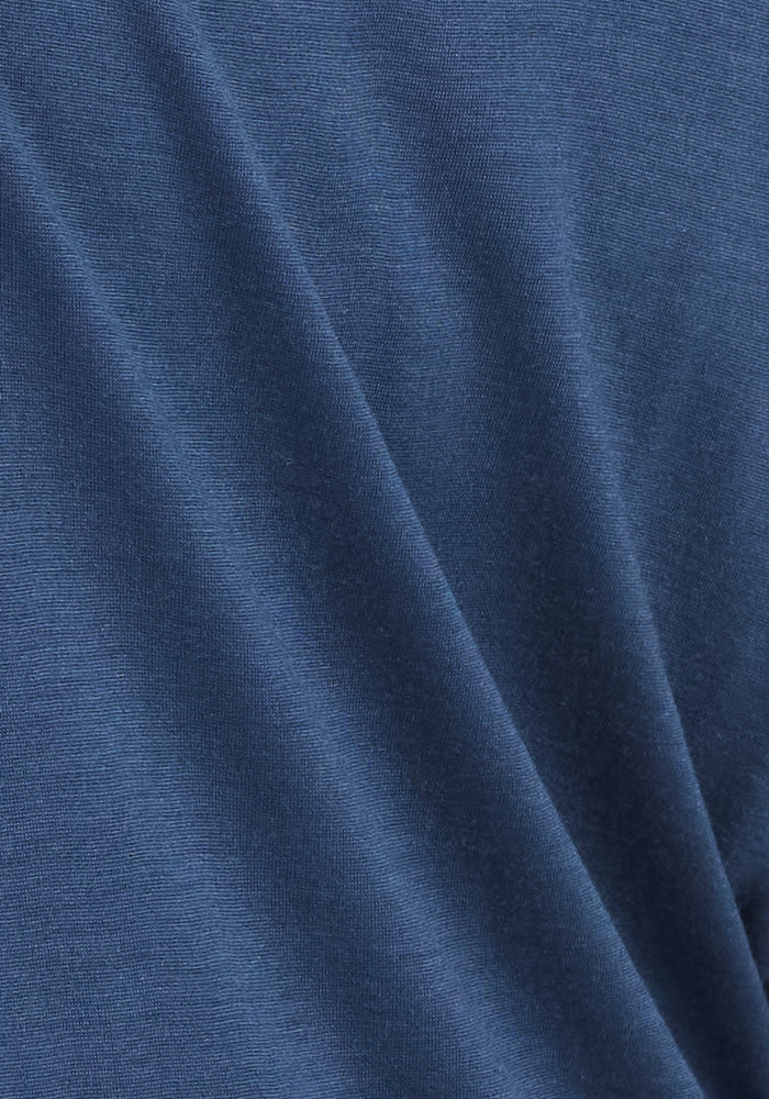 Close-up of Woolx Essential Tee • Final Sale - Starry Night Merino wool fabric with soft folds and a smooth, shiny finish.