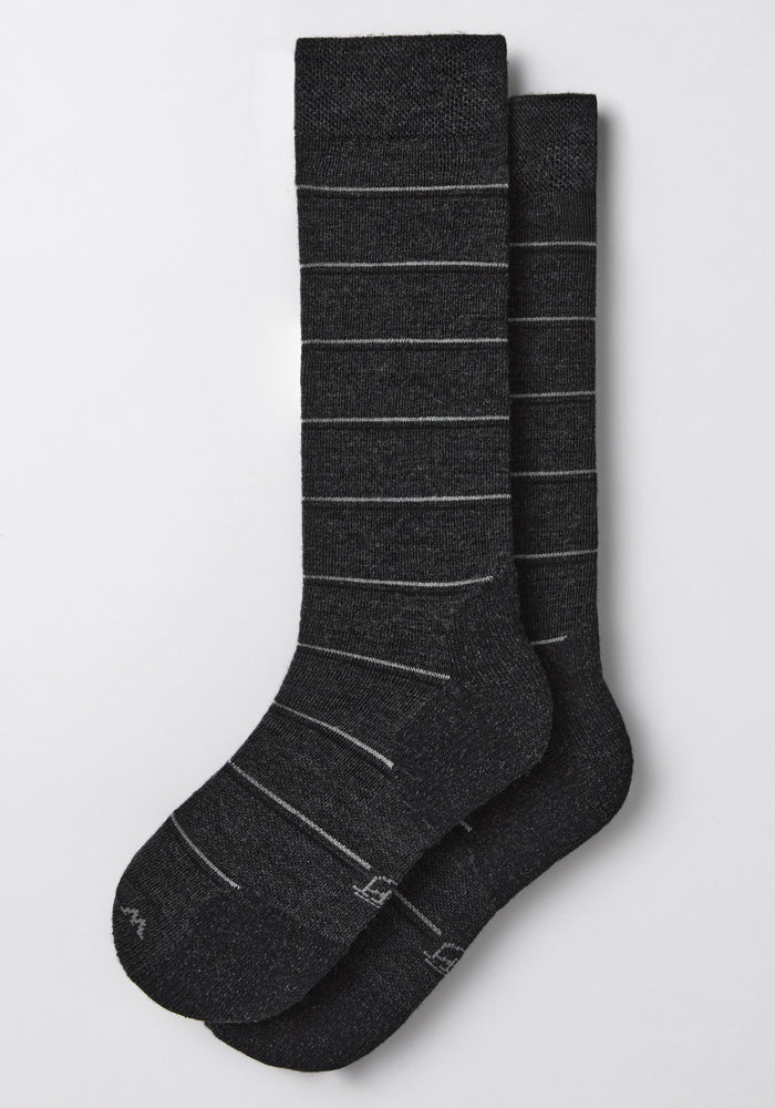 The Woolx Mens Chandler Mid Calf Socks in dark grey charcoal feature a lightweight design and thin light gray stripes, shown laid flat on a white background.