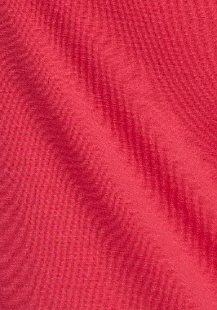 Close-up of Woolx Liza Crew Neck Tee in Berry Ice Pop, featuring soft Australian Merino wool and subtle shadow.