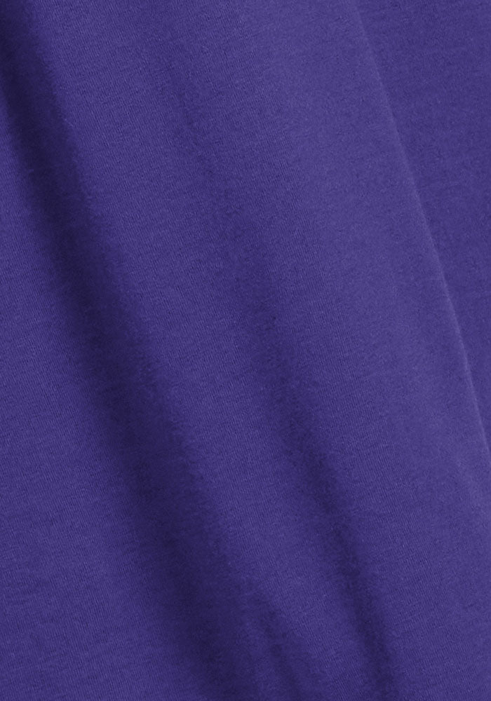 Close-up of the Woolx Georgie Dress in Berry Indigo, featuring its smooth Merino wool texture and soft folds.