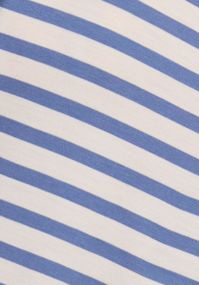 Close-up of the Woolx Junie V Neck in Blue Sand Stripe, featuring regular diagonal blue and white stripes on odor-resistant Merino wool—its texture is perfect for a women’s relaxed fit tee.