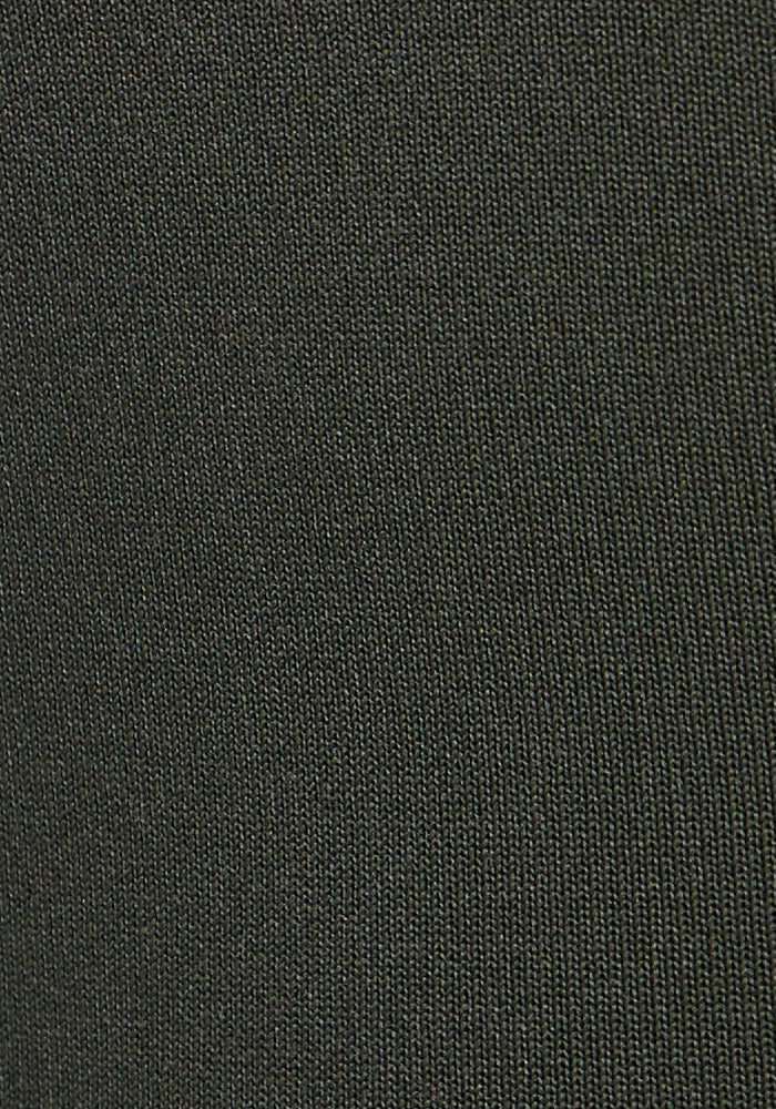 Close-up of the tightly woven dark grey fabric of Woolx Merino Flex® McKenna Capris - Everleaf, featuring fine, visible threads and moisture-wicking properties—ideal for women's activewear.