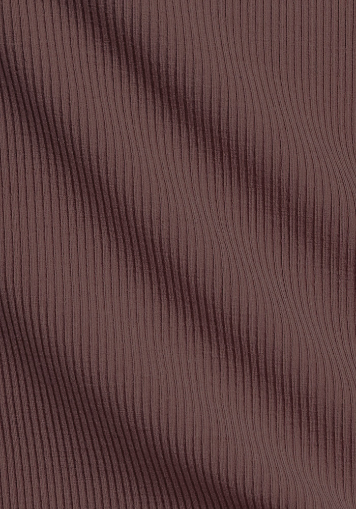 Close-up of Woolx Raegan Ribbed Tank Top in Peppercorn, showing merino wool with vertical ribbed texture and soft shadows.