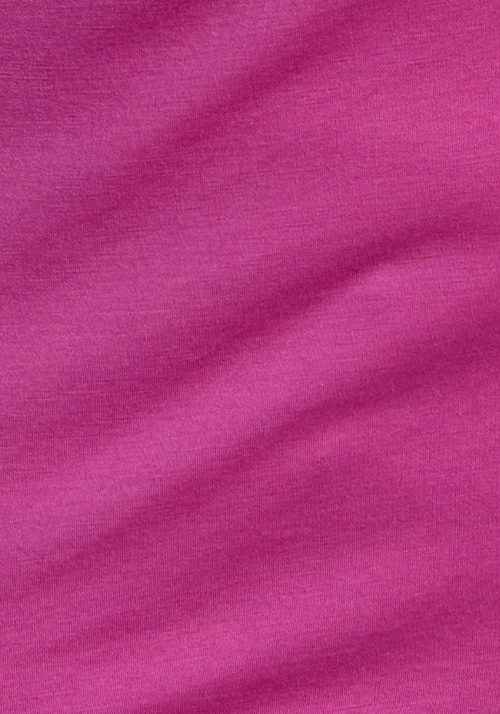 Close-up of the Livi Bra - Summer Sorbet by Woolx, showing soft pink fabric with smooth, seamless texture.