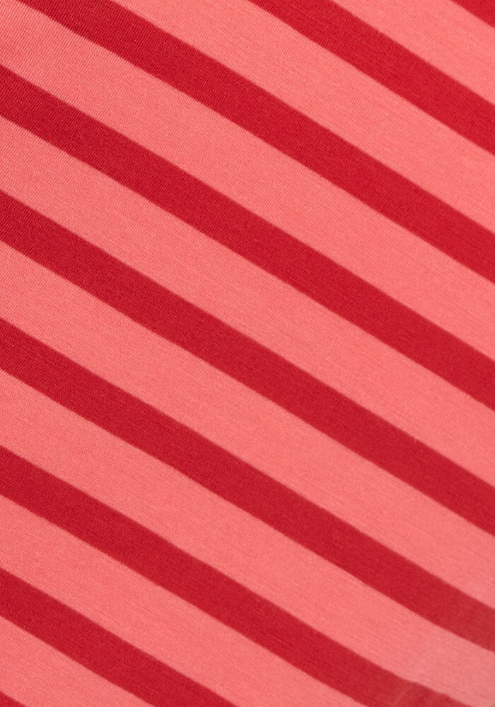 Diagonal red and pink stripes give the Woolx Bella Tunic Top - Wildberry Stripe a bold, lightweight merino design—ideal for women’s summer wear.