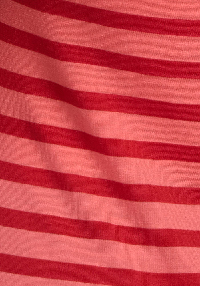 Woolx Junie V Neck t-shirt in Wildberry Stripe—pink and red merino wool with soft texture and gentle folds.