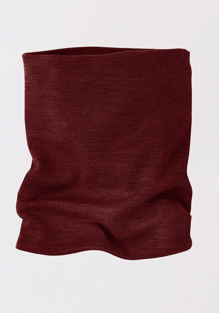 The Woolx Neck Gaiter, in Cranberry Melange, made from soft, stretchy Australian Merino wool, is shown on a light background. Its smooth yet slightly rippled texture makes it ideal for outdoor activities.